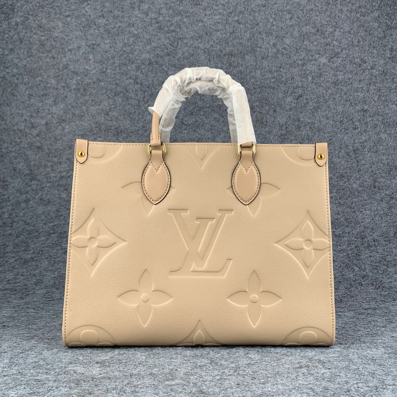 LV Onthego MM Beige Monogram Empreinte Tote Bag