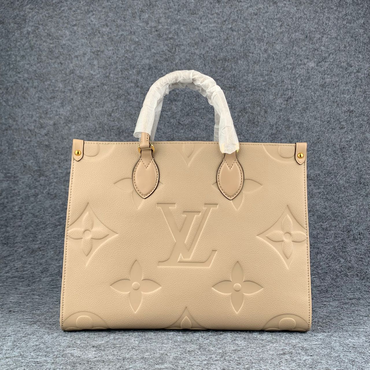 LV Onthego MM Beige Monogram Empreinte Tote Bag